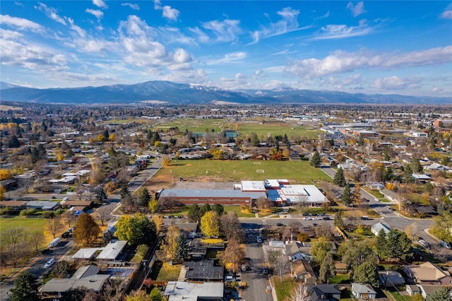 birds eye view of property featuring a mountain view