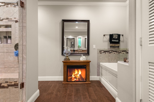 bathroom with shower with separate bathtub, wood-type flooring, and crown molding