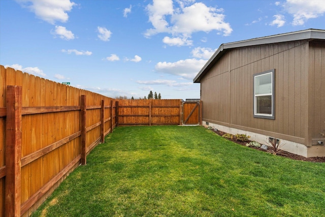 view of yard featuring a gate