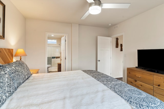 bedroom with ceiling fan and ensuite bath