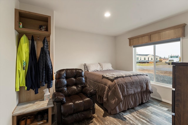 bedroom featuring dark hardwood / wood-style floors