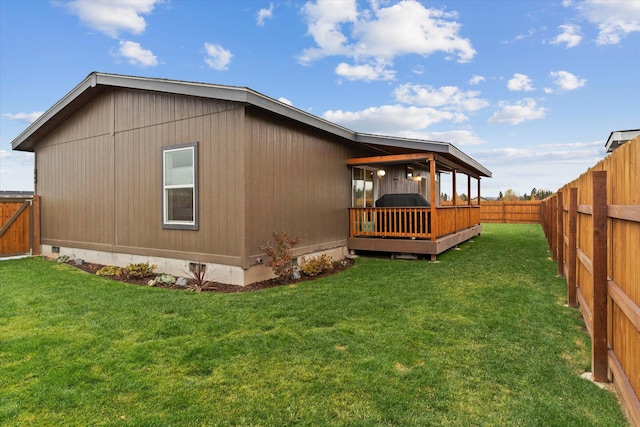 back of house with a deck and crawl space