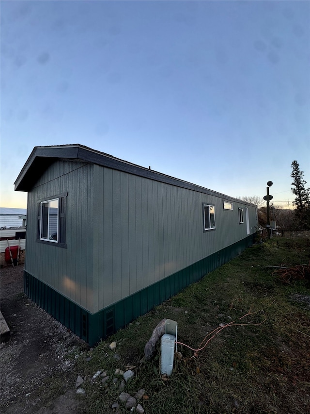 view of property exterior at dusk