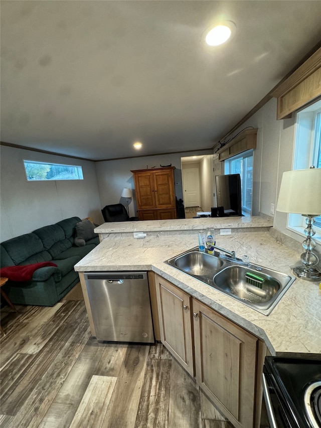 kitchen featuring wood-type flooring, light brown cabinets, sink, stainless steel dishwasher, and kitchen peninsula