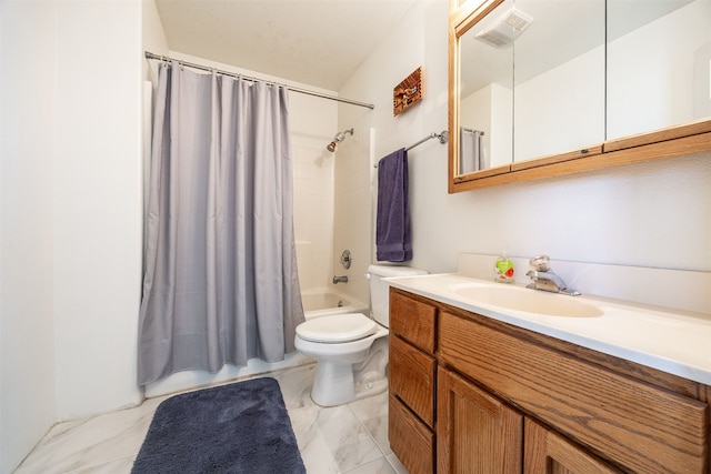 full bathroom featuring shower / bath combo, vanity, and toilet