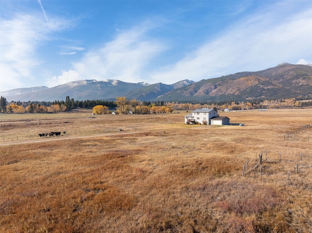 view of mountain feature with a rural view