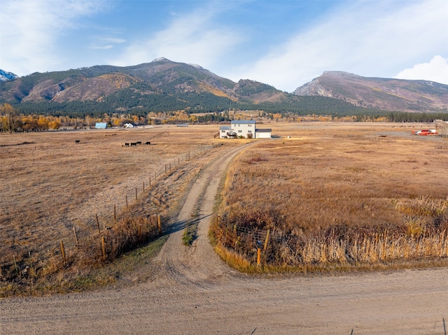 view of mountain feature with a rural view