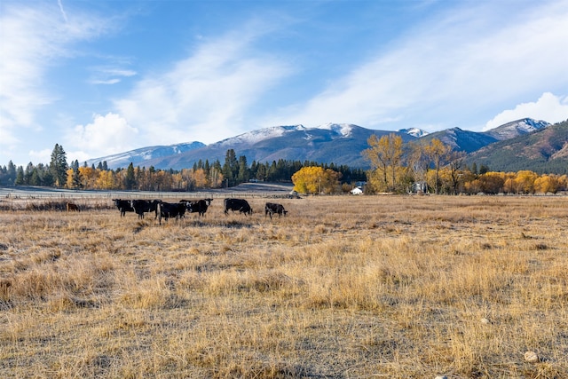 property view of mountains featuring a rural view