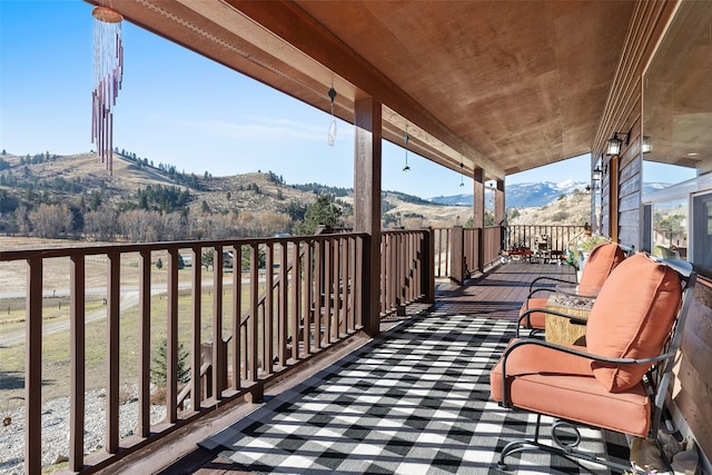 balcony featuring a mountain view