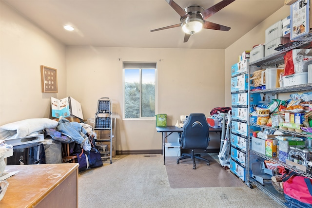 office area featuring ceiling fan and light colored carpet