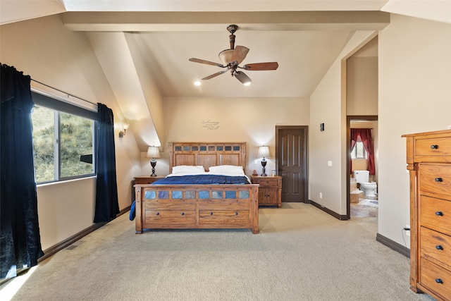 carpeted bedroom with ceiling fan and lofted ceiling