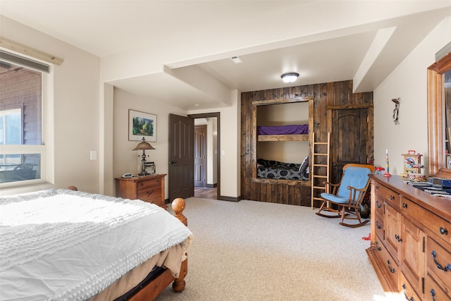 bedroom featuring light carpet