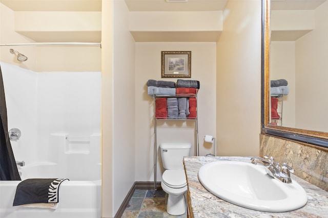 full bathroom with washtub / shower combination, vanity, toilet, and tasteful backsplash