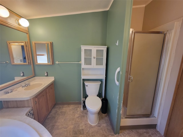 bathroom featuring vanity, crown molding, and a shower with door