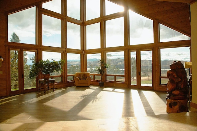 sunroom / solarium with a wealth of natural light and a mountain view