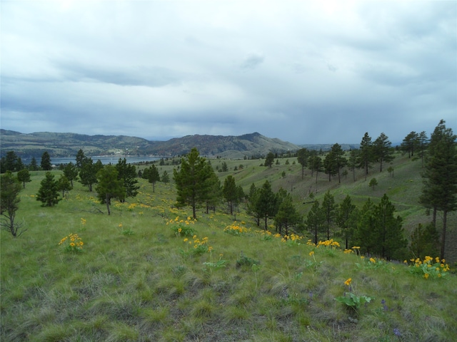 property view of mountains featuring a rural view