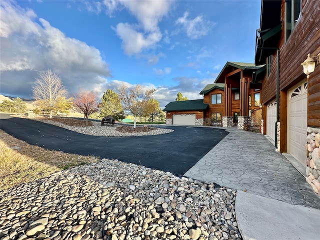 view of yard with a garage