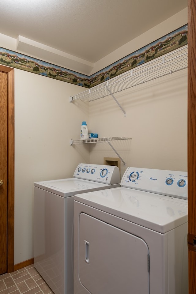 laundry room featuring independent washer and dryer