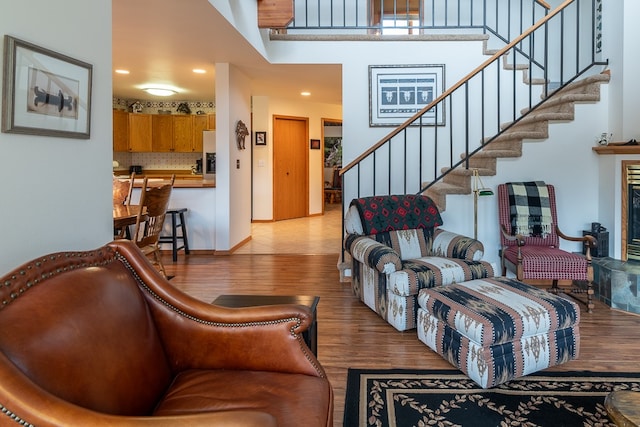 living room featuring a fireplace and light hardwood / wood-style floors