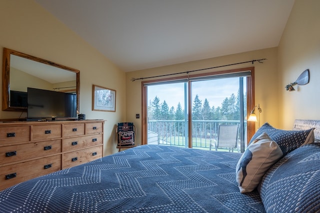 bedroom featuring access to exterior and lofted ceiling