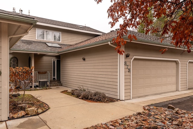 view of property exterior with a garage