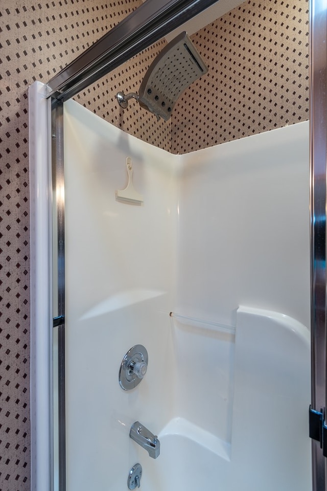 interior details with washtub / shower combination