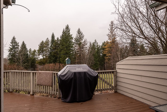 wooden deck with grilling area