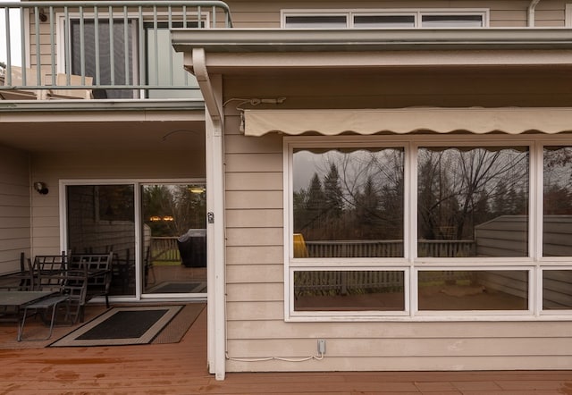 property entrance with a balcony