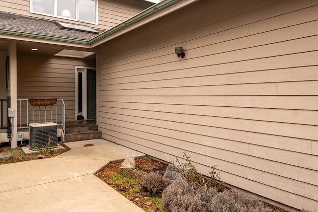 exterior space featuring central AC unit