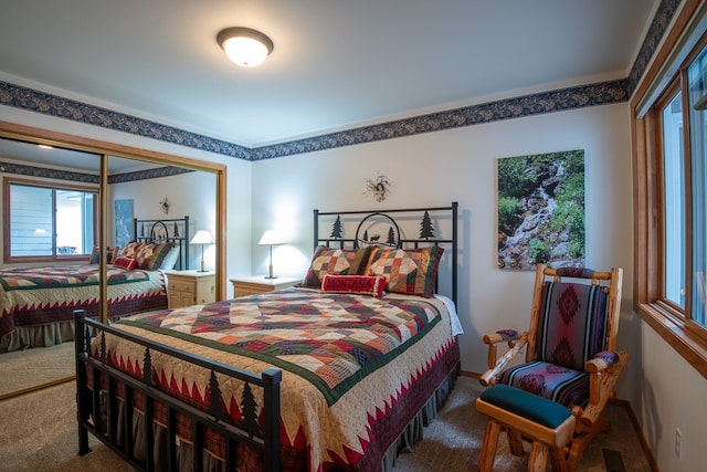 carpeted bedroom featuring a closet