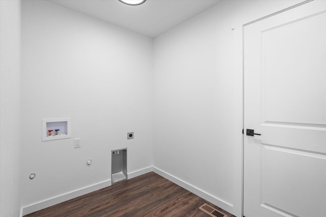 laundry area with hookup for a gas dryer, washer hookup, hookup for an electric dryer, and dark wood-type flooring