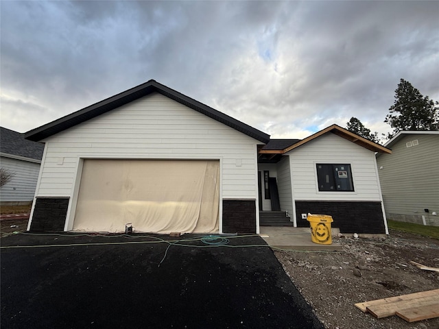 view of front of property with a garage