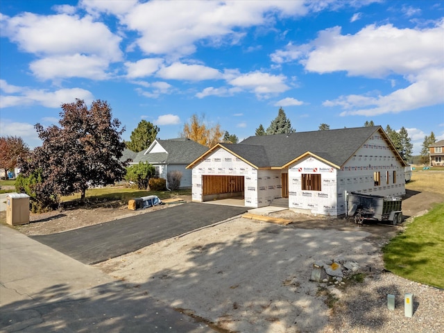 property in mid-construction featuring a garage