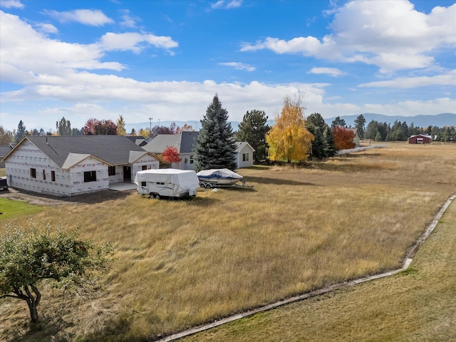 drone / aerial view featuring a mountain view