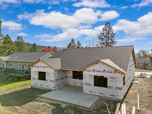 property in mid-construction with a patio