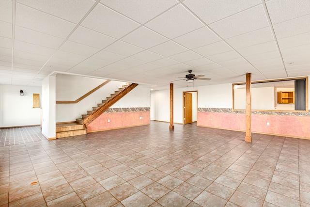 451 1st Rd NE, Fairfield, MT 59436 - finished basement featuring wainscoting, stairway, a paneled ceiling, and ceiling fan