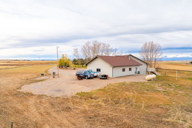 451 1st Rd NE, Fairfield, MT 59436 - view of property exterior featuring dirt driveway and a rural view