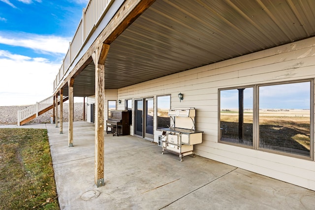 451 1st Rd NE, Fairfield, MT 59436 - view of patio featuring stairway