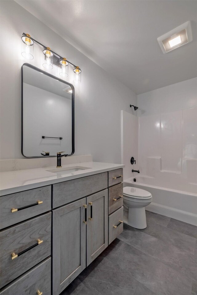 full bathroom with shower / bathing tub combination, vanity, and toilet