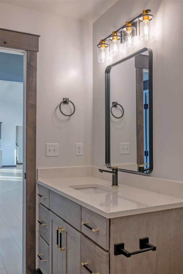 bathroom with vanity and tile patterned floors