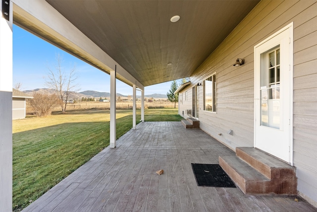 view of patio / terrace with a mountain view