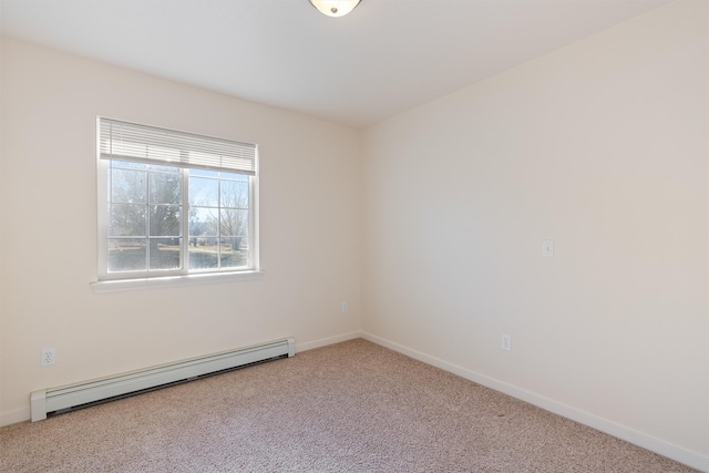 unfurnished room featuring baseboard heating and carpet floors