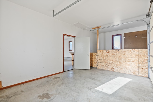 empty room with concrete flooring