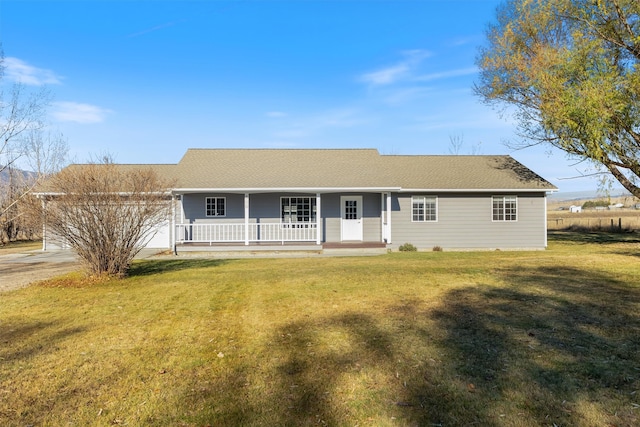 single story home featuring a porch and a front yard