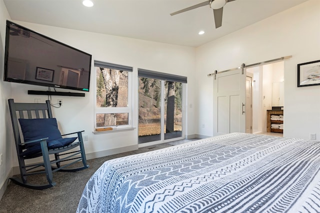 carpeted bedroom with a barn door, ceiling fan, and access to outside