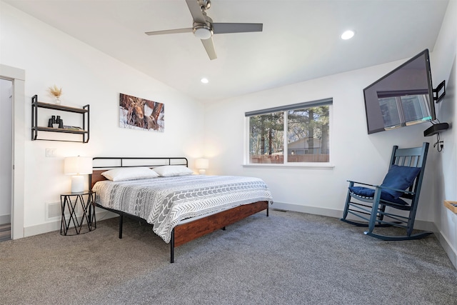 bedroom featuring carpet, vaulted ceiling, and ceiling fan