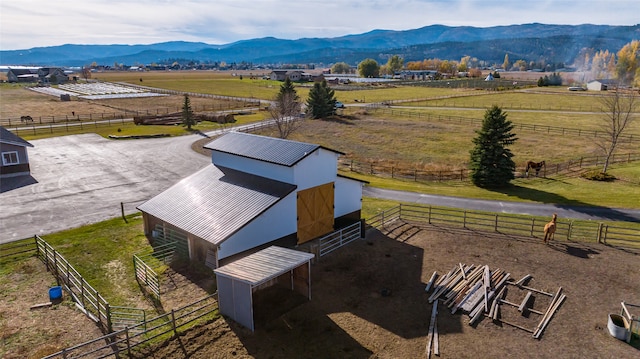 birds eye view of property featuring a rural view and a mountain view