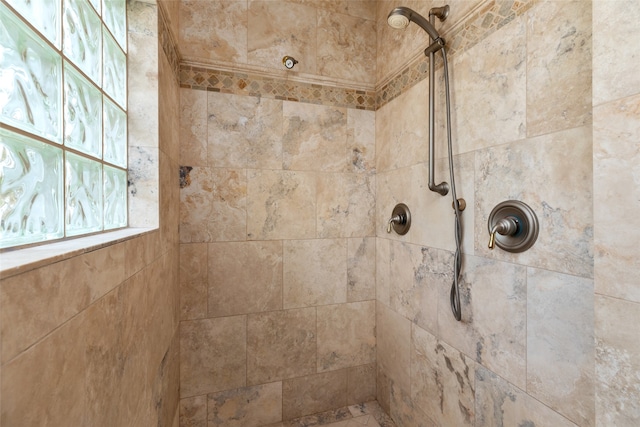 bathroom featuring tiled shower