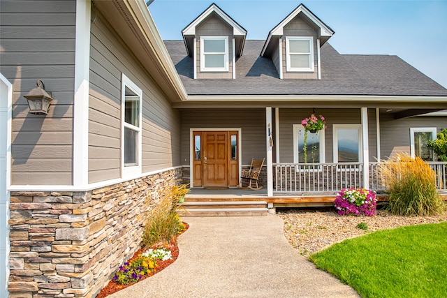 entrance to property featuring covered porch