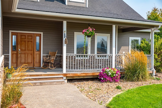 entrance to property with a porch